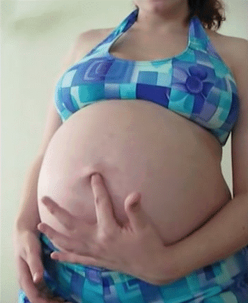 Pregnant belly navel play