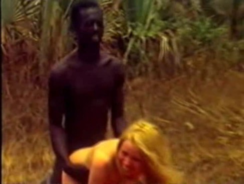 Black tribesman loving white woman