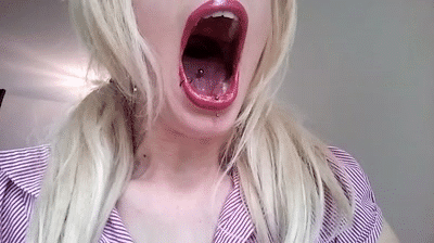 Girl open wide mouth burping